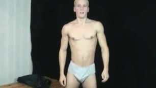 Blond muscle boy shows off tight body for gay man