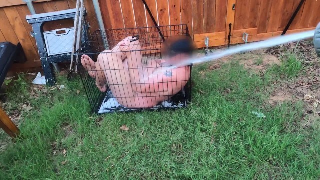 Femdom Wife Humiliates Small Penis Husband Hoses him like a Zoo Animal in a Dog Cage